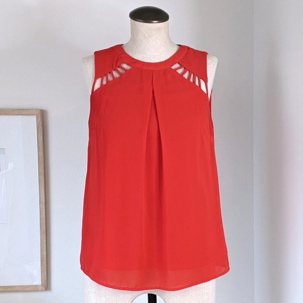 red sleeveless work blouse with cutout detailing, small